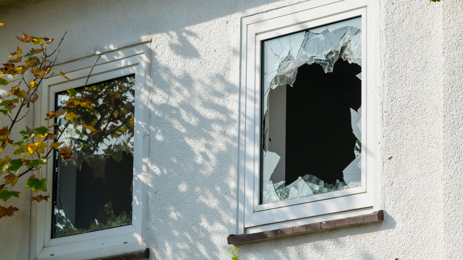 House with broken glass window